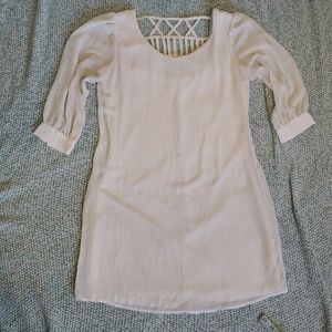 White dress with decorative back